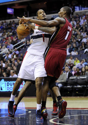 Calf strain means Trevor Ariza to miss games against former teams