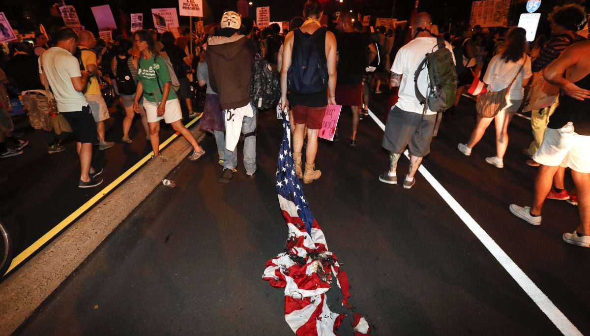 D.C. college students burn flag to protest Trump