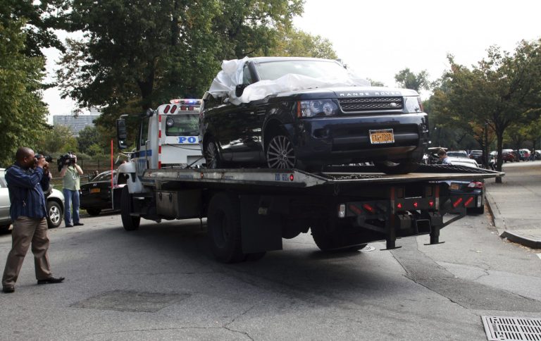 The Range Rover involved in the bikers attack is being moved from the police precinct for further police investigation on Oct. 5 in New York. (AP/David Karp)