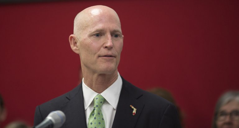 Gov. Rick Scott on Monday proposed spending more than $213 million for a transportation hub including a rail line at Orlando International Airport. (AP Photo/J Pat Carter)