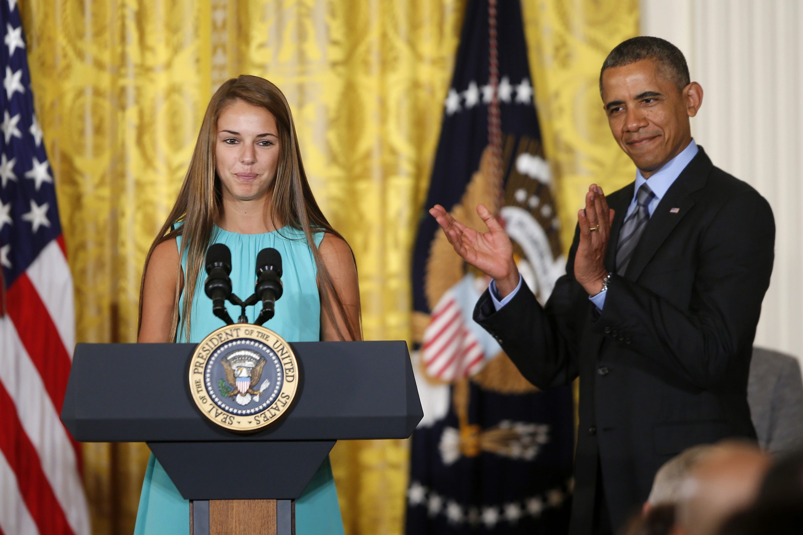 Obama says sports concussions need more attention