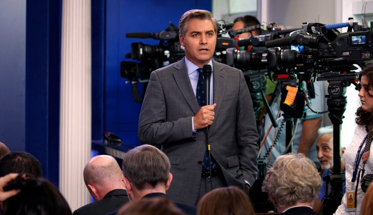 In this Nov. 7, 2018, photo, CNN journalist Jim Acosta does a standup before a new conference with President Trump in the East Room of the White House in Washington.