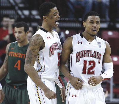 Patrick Semansky/APNick Faust, left, has averaged 13.0 points and five rebounds in his last seven games.