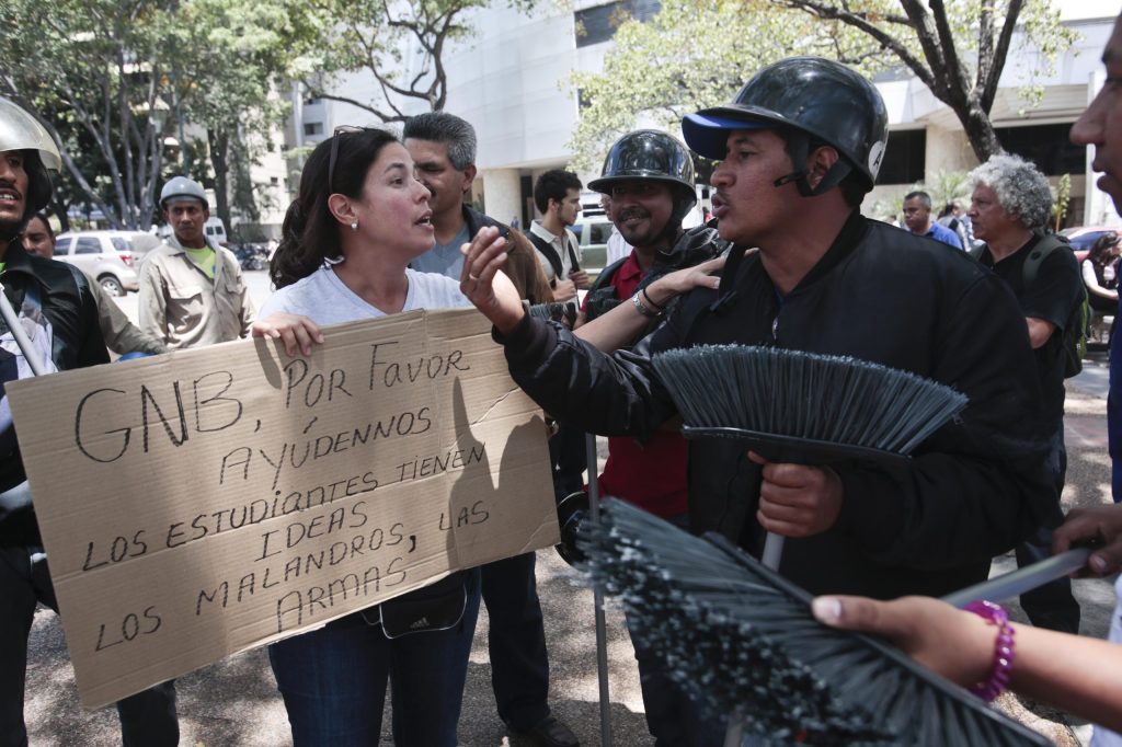 Venezuelan troops take control of protest plaza