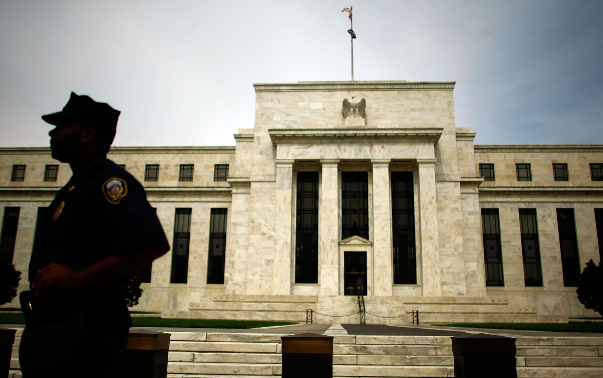 Fed delays major part of Volcker Rule