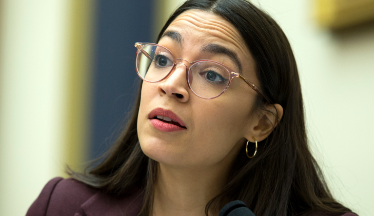 Rep. Alexandria Ocasio-Cortez, D-N.Y., speaks during a House Financial Services Committee hearing on financial stability, on Capitol Hill, Thursday, Dec. 5, 2019, in Washington. (AP Photo/Jose Luis Magana)