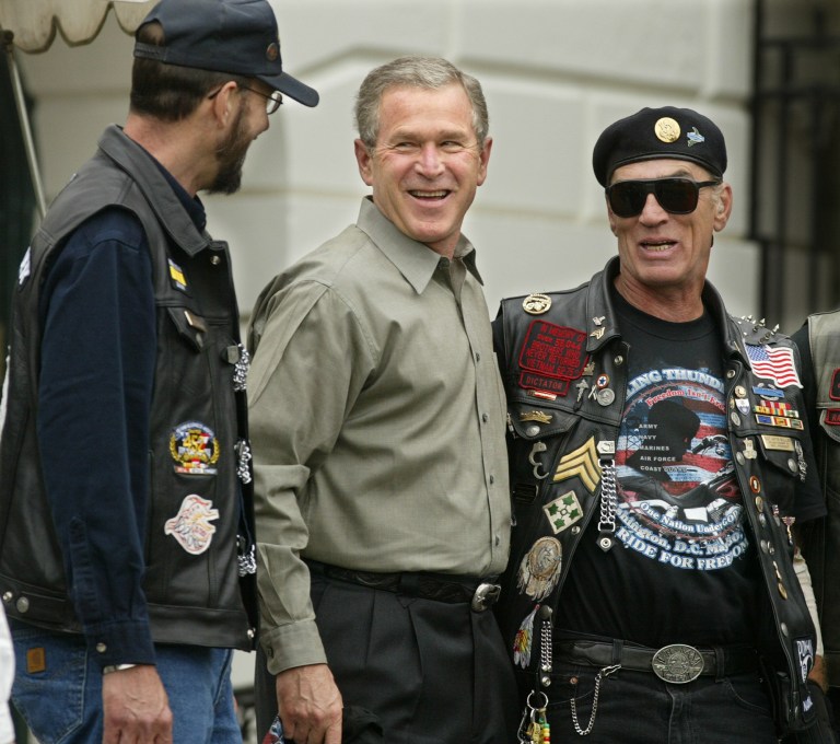 President Bush, center, meets with Artie Muller, right, President of Rolling Thunder.