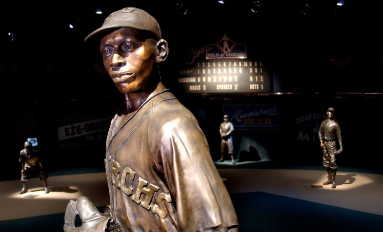 In this Jan. 27, 2005 photo, bronze statues of Negro League greats including pitcher Satchel Paige, front, play their positions on the Field of Legends, which is the centerpiece of the Negro Leagues Baseball Museum in Kansas City, Mo. 