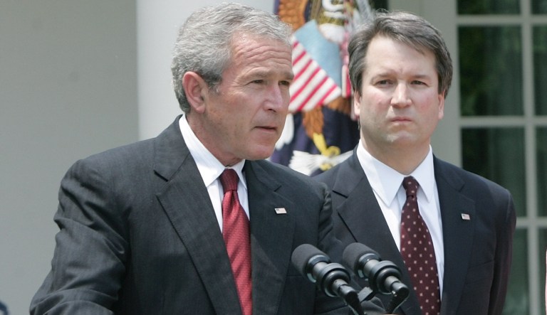 President George W. Bush speaks in the Rose Garden of the White House before the swearing-in of Brett Kavanaugh as judge for the U.S. Court of Appeals for the District of Columbia on June 1, 2006 in Washington.