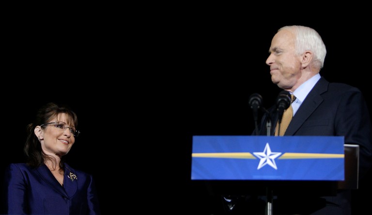Sen. John McCain, R-Ariz., looks at Gov. Sarah Palin, R-Alaska, during an election night rally in Phoenix, Nov. 4, 2008.