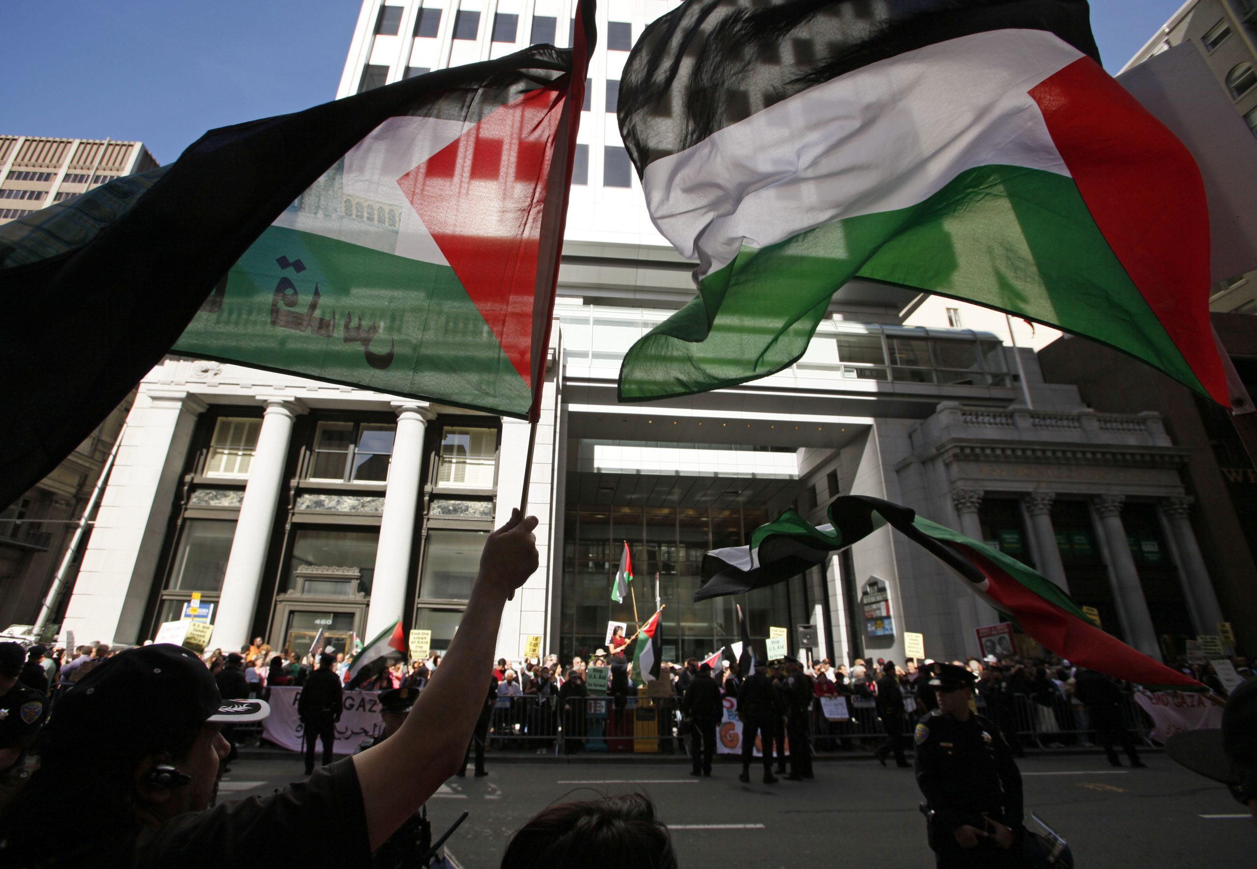 Protesters wave the Palestinian flag during a demonstration outside the Israeli consulate in San Francisco.