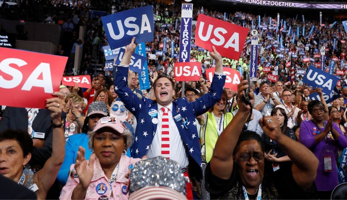 Delegates react during the final day of the Democratic National Convention in Philadelphia, Thursday, July 28, 2016. 