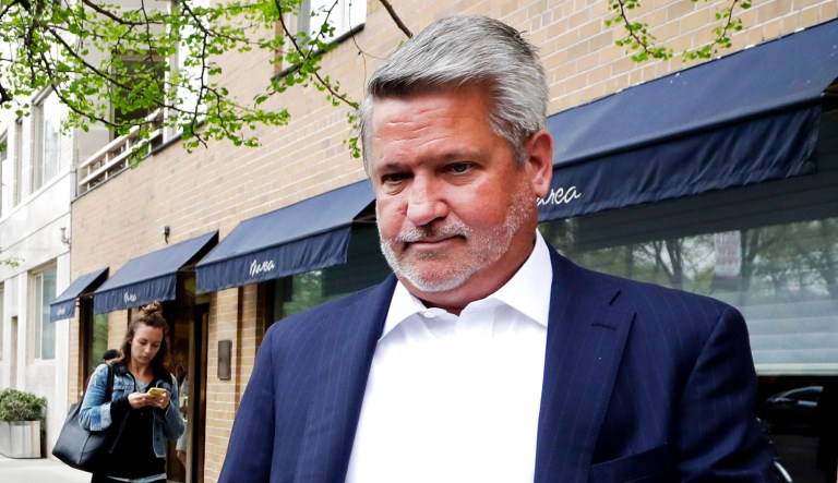 In this 2017 photo, Fox News co-president Bill Shine, right, leaves a New York restaurant.