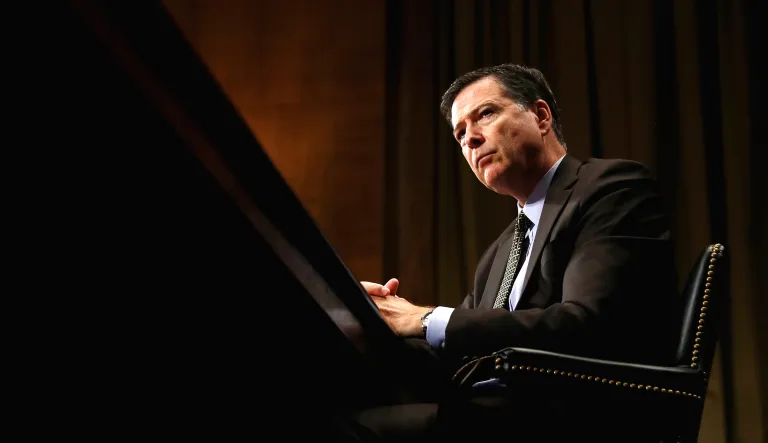 In this 2017 photo, then-FBI Director James Comey pauses as he testifies on Capitol Hill in Washington.
