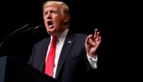 In this Friday, June 16, 2017, file photo President Trump speaks about Cuba policy in Miami. The Trump Organization dissolved subsidiaries created to pursue business opportunities in Qatar six days after Donald Trump was inaugurated as Americaâs 45th president.