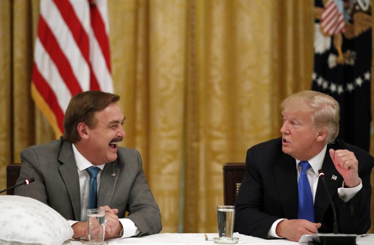 Michael Lindell, with My Pillow, laughs with President Donald Trump during a "Made in America," roundtable event in the East Room of the White House in Washington, Wednesday, July 19, 2017.