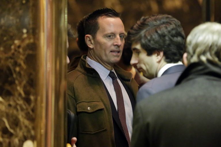 In this Dec. 12, 2016, file photo, Richard Grenell, left, arrives at Trump Tower in New York.