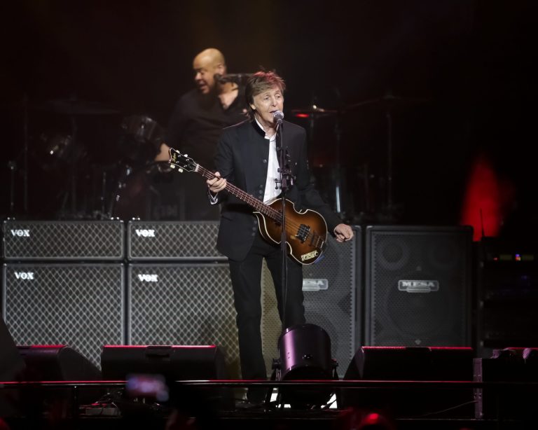 Singer/songwriter Paul McCartney performs on stage.