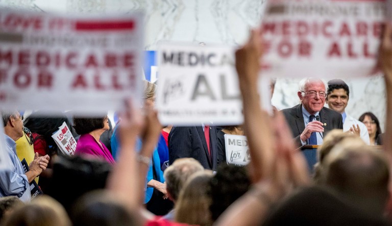 Sen. Bernie Sanders, I-Vt., right, speaks at a news conference on Capitol Hill in Washington, Wednesday, Sept. 13, 2017, to unveil Medicare for All legislation to reform health care.