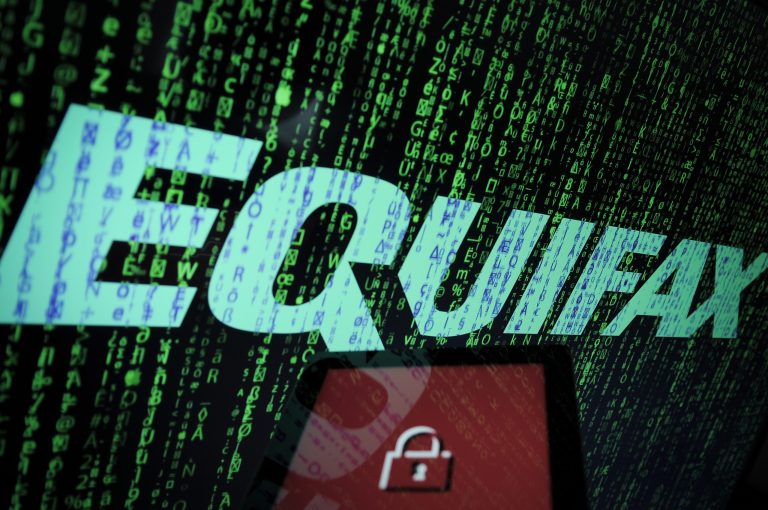 An Equifax logo is seen in this photo illustration. The consumer credit reporting agency was hacked twice in 2017. In the last attack in July financial data belonging to over 145 million Americans was stolen including social security numbers, credit card numbers and addresses. (Photo by Jaap Arriens/NurPhoto/Sipa USA)