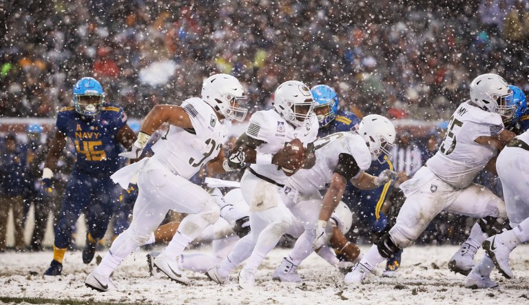 Army's Ahmad Bradshaw, center, during the first half of an NCAA college football game against the Navy, Saturday, Dec. 9, 2017, in Philadelphia.