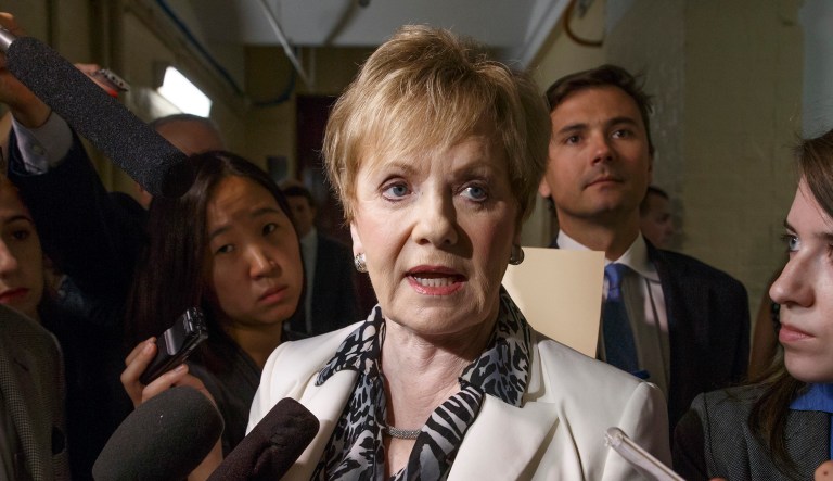 Rep. Kay Granger (R-TX) is surrounded by reporters on Capitol Hill in Washington.