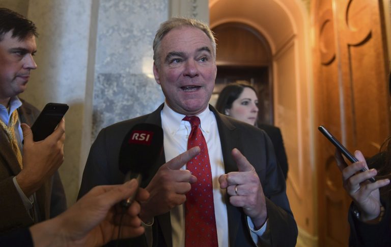 Sen. Tim Kaine, D-Va., talks with reporters on Capitol Hill in Washington, Monday, Jan. 22, 2018, after passage of a procedural vote aimed at reopening the government.