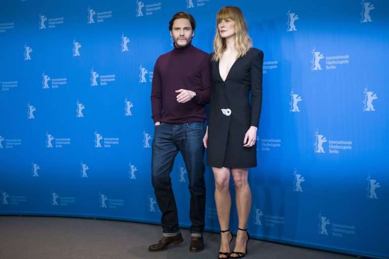 Actors Rosamund Pike, right, and Daniel Bruehl pose at photo-call for the film '7 Days in Entebbe' during the 68th edition of the International Film Festival Berlin, Berlinale, in Berlin, Germany, Monday, Feb. 19, 2018.