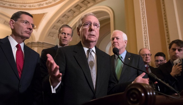 Senate Majority Leader Mitch McConnell, R-Ky., joined from left by Sen. John Barrasso, R-Wyo., Sen. John Thune, R-S.D., and Majority Whip John Cornyn, R-Texas, meets with reporters following a closed-door Republican strategy session on Capitol Hill in Washington. 