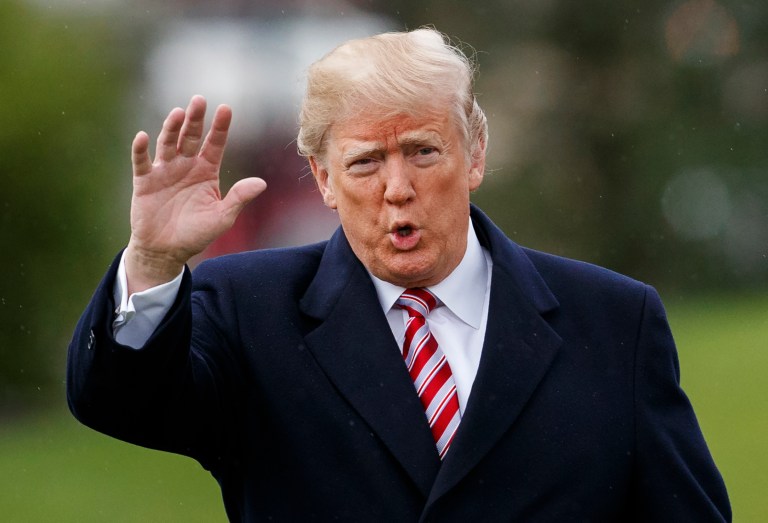 President Donald Trump waves to media as he walks from the Oval Office of the White House to Marine One in Washington, Monday, April 16, 2018, for the short trip to Andrews Air Force Base en route to Miami.