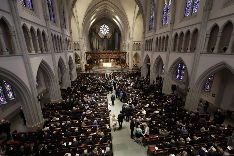 Attendees arrive at St. Martin's Episcopal Church for a funeral service for former first lady Barbara Bush on Saturday in Houston.