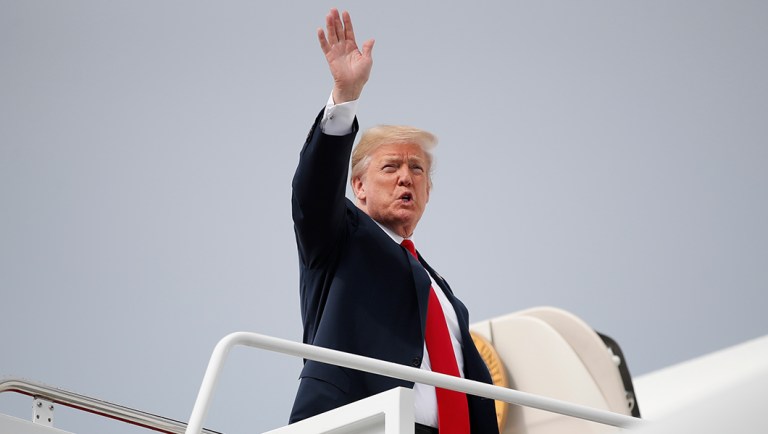 President Donald Trump boards Air Force One, Thursday, May 10, 2018, in Andrews Air Force Base, Md., en route to Elkhart, Ind., for a campaign rally.