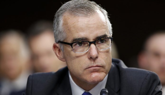 In this June 7, 2017, photo, FBI acting director Andrew McCabe listens during a Senate Intelligence Committee hearing about the Foreign Intelligence Surveillance Act, on Capitol Hill in Washington.