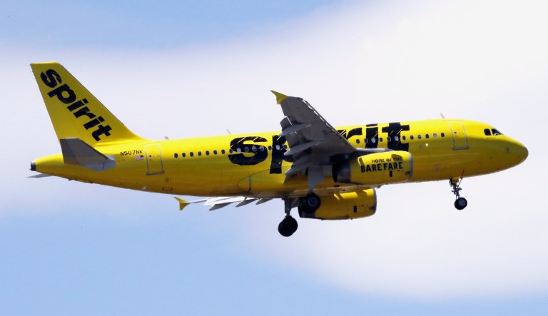 A Spirit Airlines passenger jet plane, an Airbus 319 model, approaches Logan Airport in Boston.
