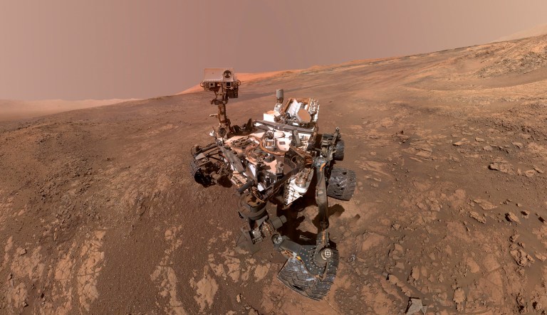 On Thursday, scientists said NASA's Curiosity Mars rover found potential building blocks of life in an ancient lakebed and confirmed seasonal increases in atmospheric methane. The rover's arm which held the camera was positioned out of each of the dozens of shots which make up the mosaic.