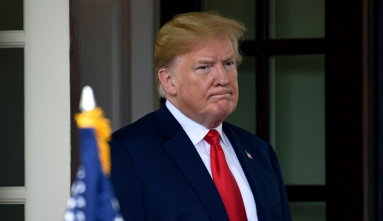 President Trump stands outside of the White House in Washington on June 27, 2018.