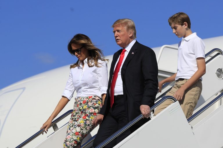 President Donald Trump, first lady Melania Trump and their son Barron Trump, disembark Air Force One upon arrival at Morristown Municipal Airport, in Morristown, N.J., Friday, June 29, 2018.