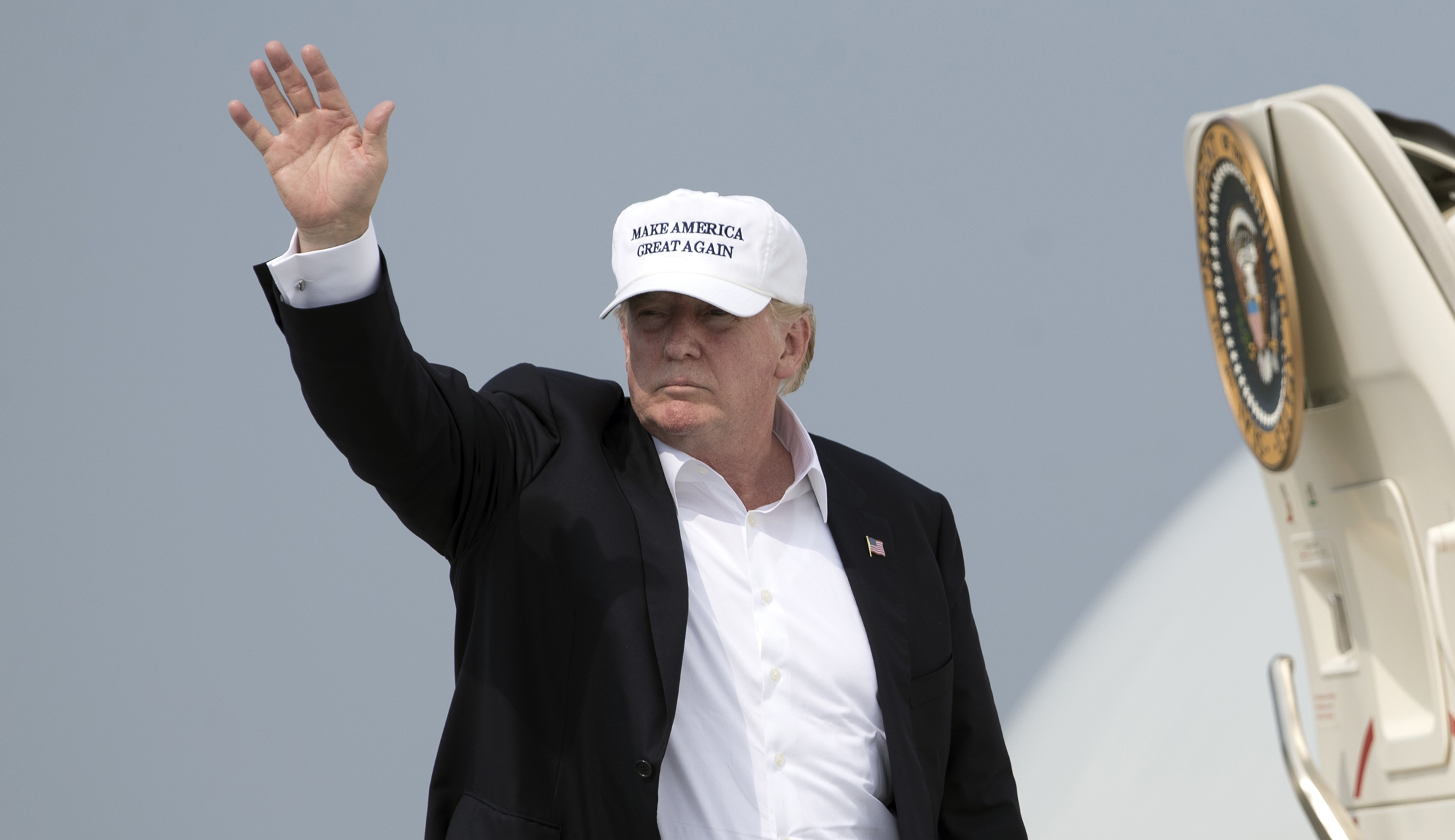 Senate candidate Patrick Morrisey greets Trump in trip to coal country