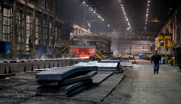 The hot-strip mill is seen as a worker walks past at the U.S. Steel Granite City Works facility iin Granite City, Illinois.
