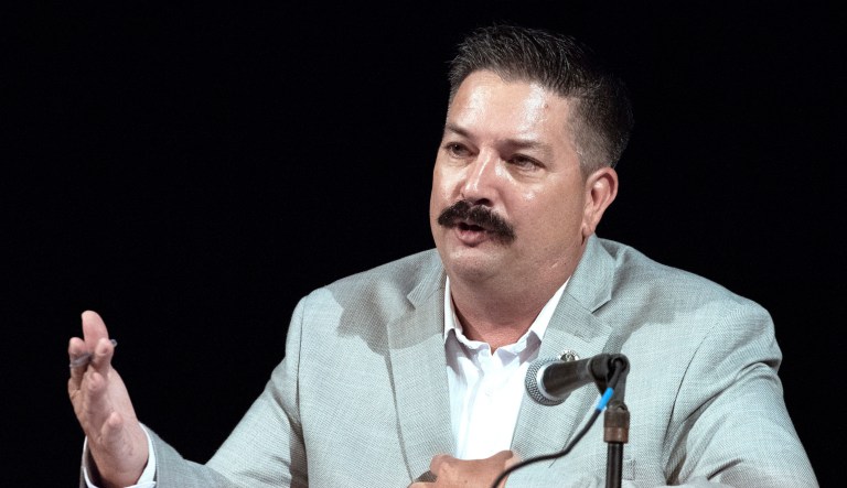 Democratic primary candidate Randy Bryce answers a question while debating his opponent, Cathy Myers, on Sunday at Badger High School in Lake Geneva, Wis.