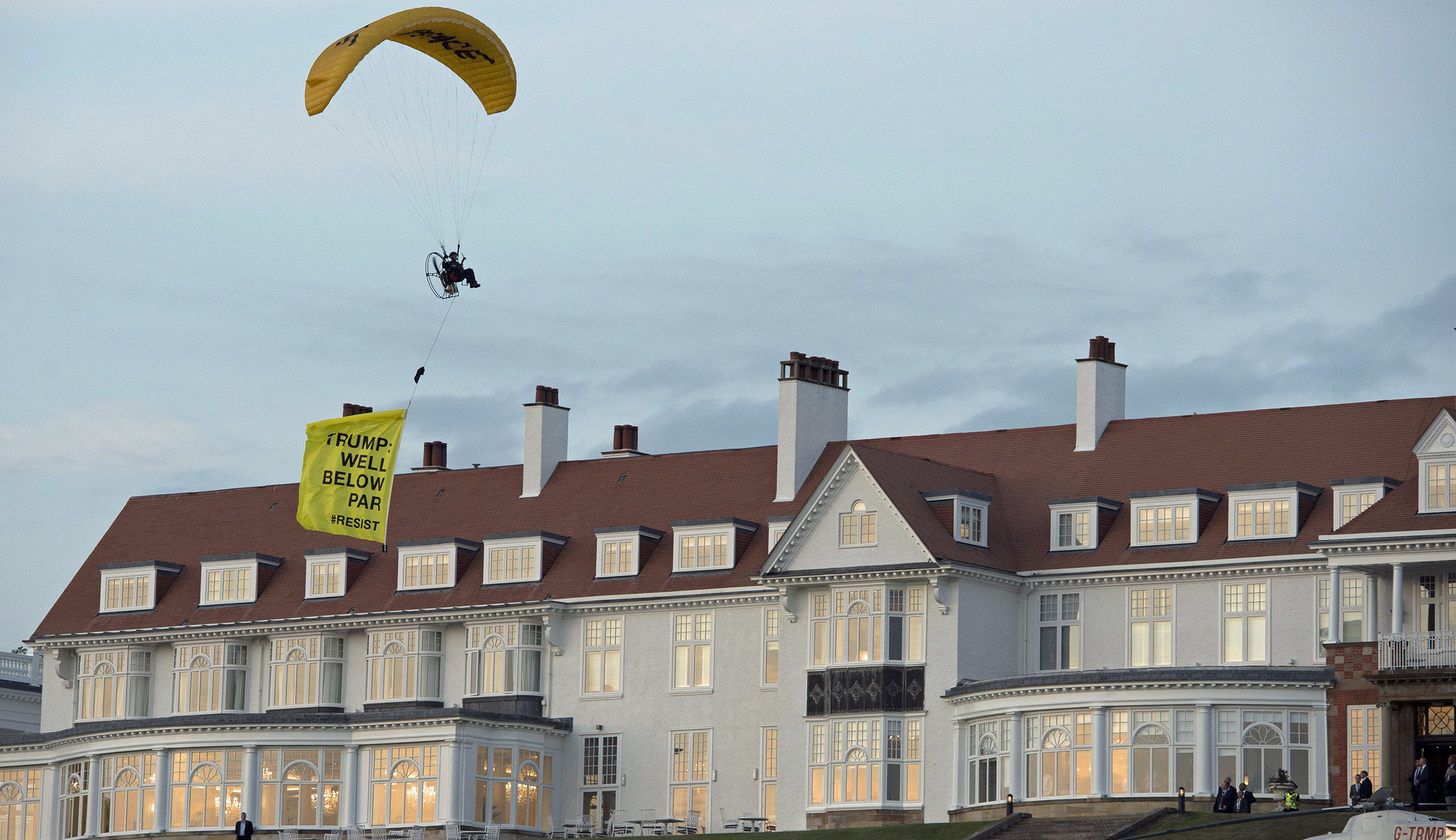 Anti-Trump paraglider arrested after flying past Trump at Scottish golf course