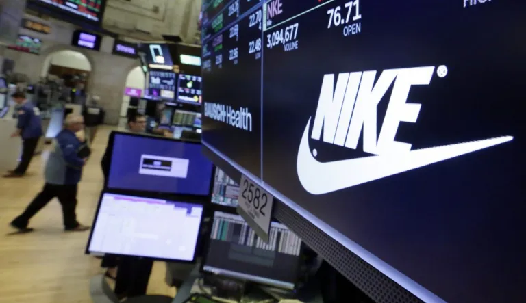 The logo for Nike is displayed above a trading post on the floor of the New York Stock Exchange July 23, 2018.