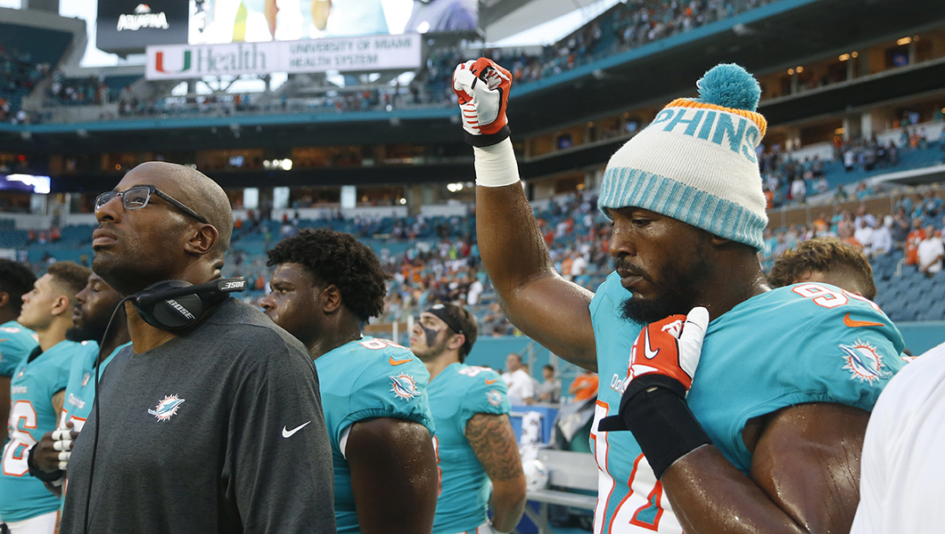 Miami Dolphins players kneel during national anthem in preseason game