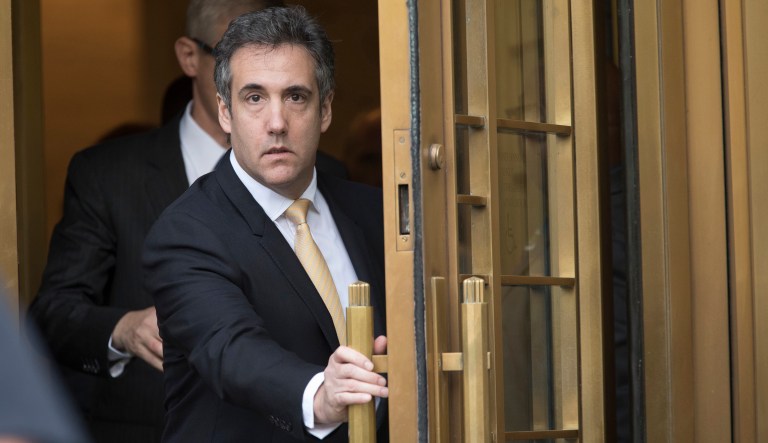 Michael Cohen leaves Federal court, Tuesday, Aug. 21, 2018, in New York.