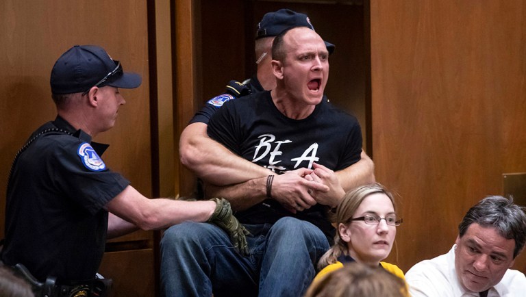 A protester disrupts the confirmation hearing of President Trump's Supreme Court nominee Brett Kavanaugh.