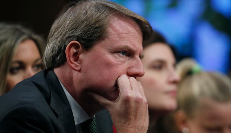 White House counsel Don McGahn listens as President Donald Trump's Supreme Court nominee, Brett Kavanaugh testifies before the Senate Judiciary Committee on Capitol Hill in Washington, Thursday, Sept. 6, 2018, for the third day of his confirmation hearing to replace retired Justice Anthony Kennedy.