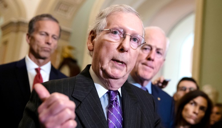 Senate Majority Leader Mitch McConnell, R-Ky., flanked by Sen. John Thune (left), R-S.D., and Majority Whip John Cornyn (right), R-Texas, speaks with reporters on Capitol Hill in D.C.