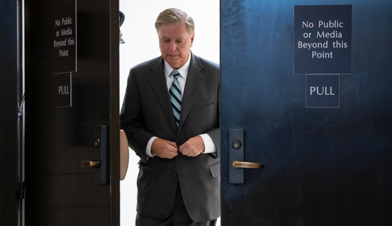 Sen. Lindsey Graham, R-S.C., a member of the Senate Judiciary Committee, emerges from a secure underground room in the Capitol after reading a new FBI background file on sexual allegations that have been made against Supreme Court nominee Brett Kavanaugh, in Washington, Wednesday, Oct. 3, 2018. 