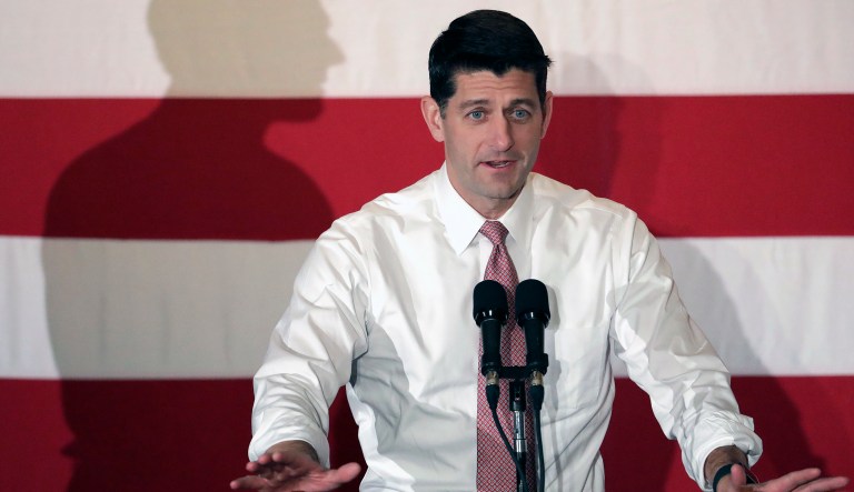 The shadow of Jay Webber, Republican candidate for Congress in the 11th District of New Jersey, is seen on a large flag as U.S. House Speaker Paul Ryan speaks during a campaign event, Wednesday, Oct. 17, 2018, in Hanover, N.J.