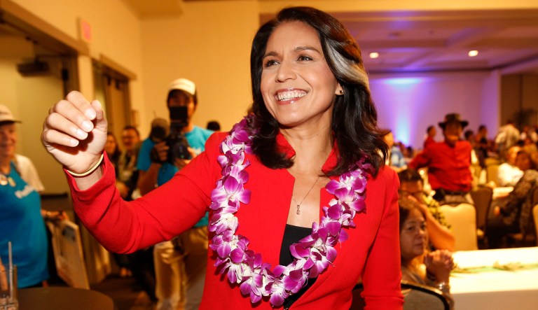 Rep. Tulsi Gabbard, D-Hawaii, greets supporters.